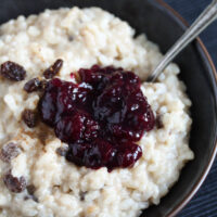 condensed milk rice with raisins and blueberry sauce