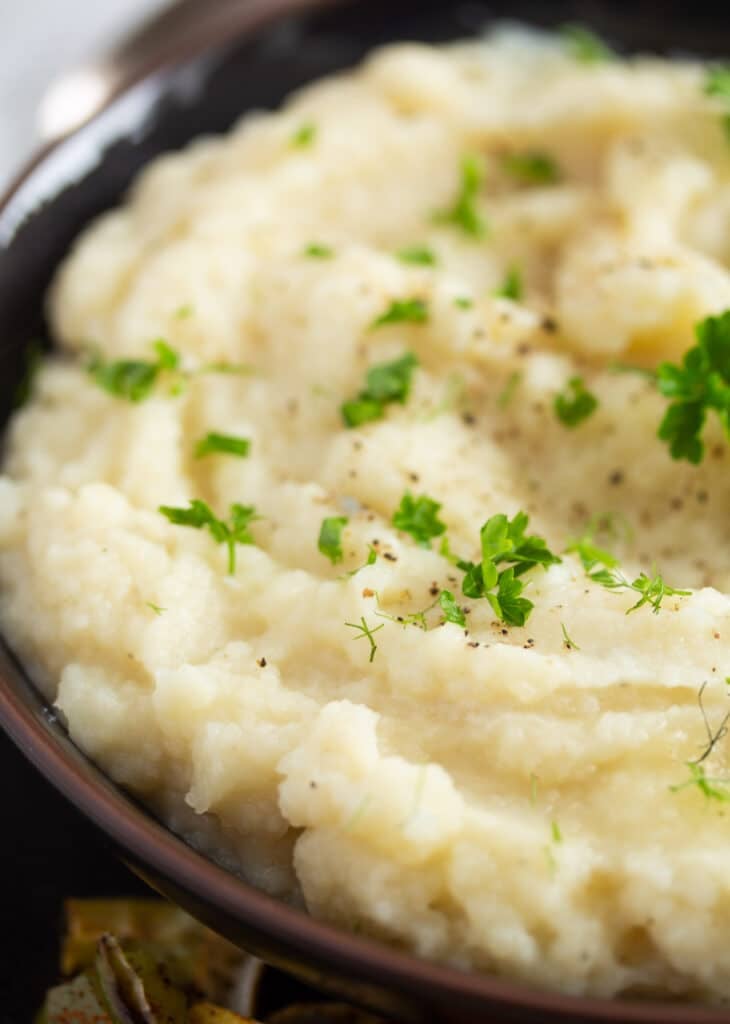 mashed celeriac sprinkled with parsley and pepper.