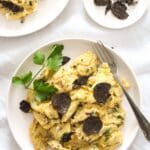 pin image with the title eggs with black truffles.
