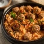 pinterest image with the title german meatballs with sauerkraut.