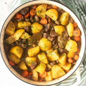 lamb and potato stew in a large dutch oven.