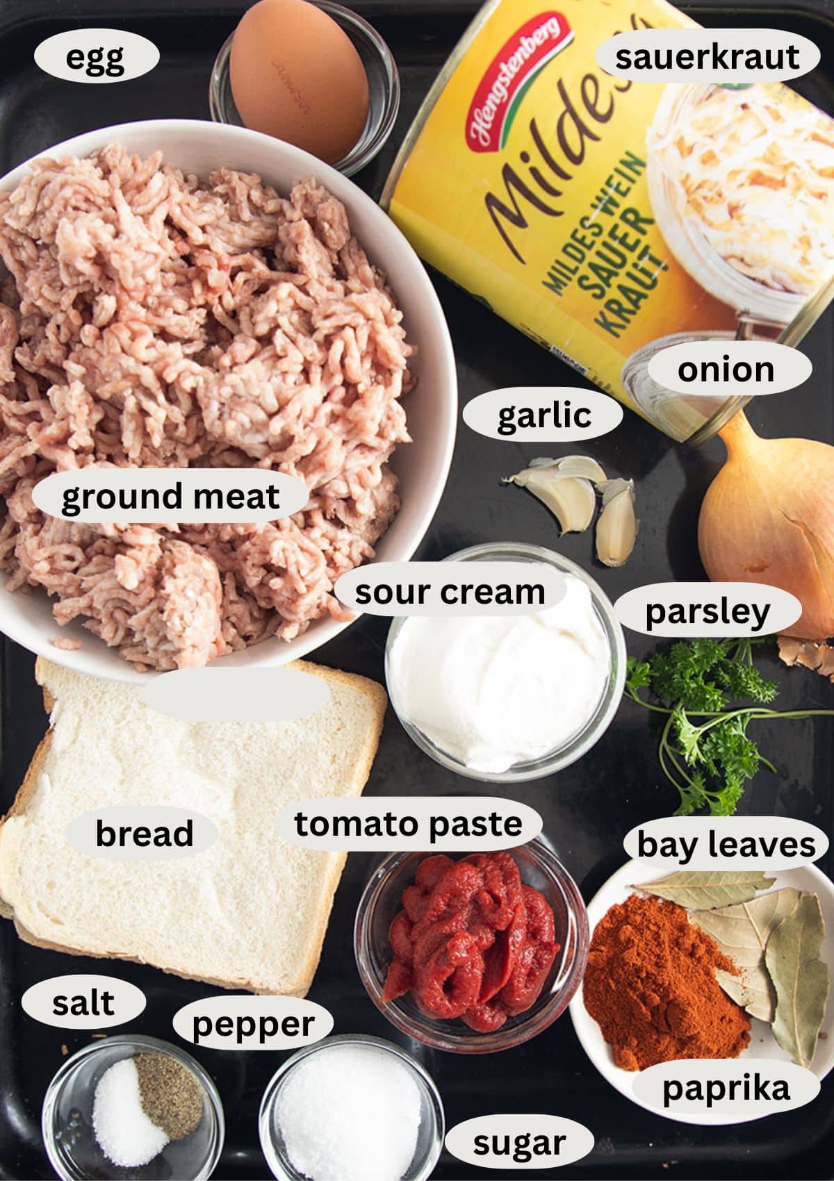 labeled ingredients for making german meatballs with sauerkraut from a can.