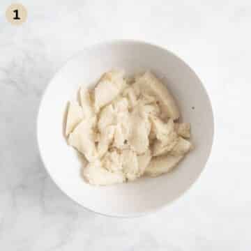 white bread pieces needeed for making meatballs soaking in a bowl.