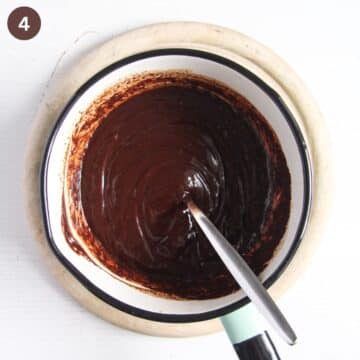 melted chocolate mixture for fillling a tart in a saucepan.