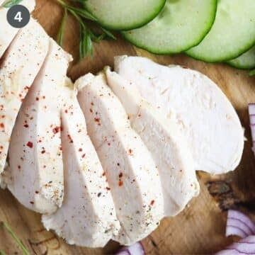 sliced boiled chicken breast and cucumber.
