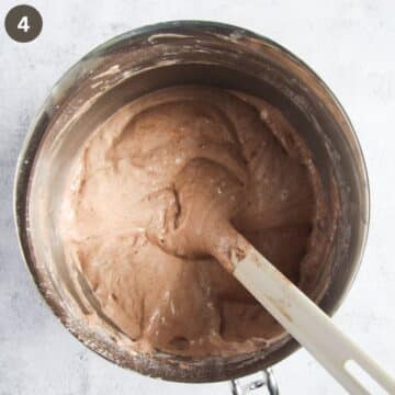 folding cocoa powder into cake batter.