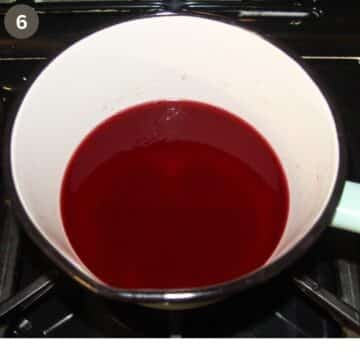 cherry juice for making cherry filling for cake in a saucepan.