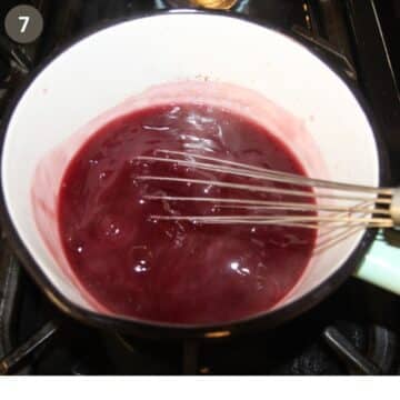 whisking and thickening cherry juice in a small saucepan.