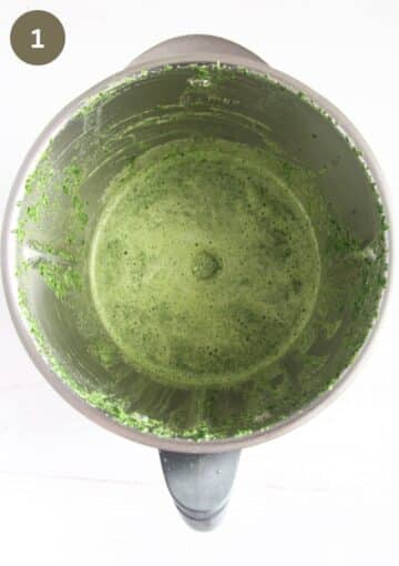 blended spinach mixture for making bread in a food processor.