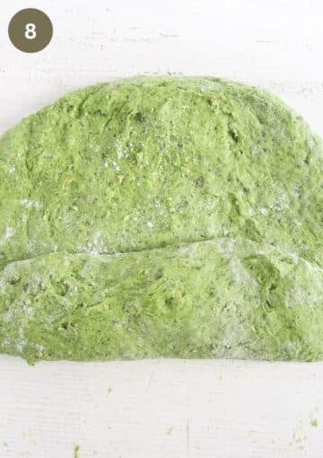 folding green dough for bread.