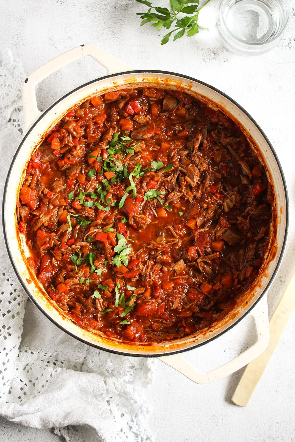 a large pot full of lamb ragu made with leftover meat.