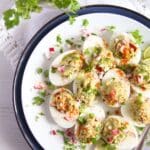 pinterest image for mexican deviled eggs.