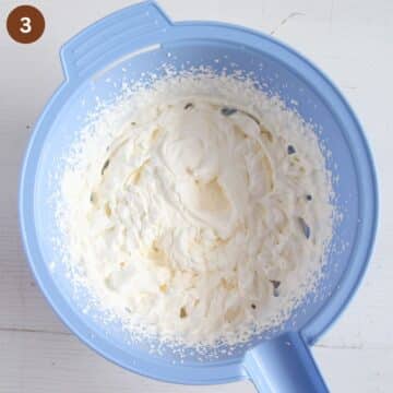 whipped cream in a blue bowl.