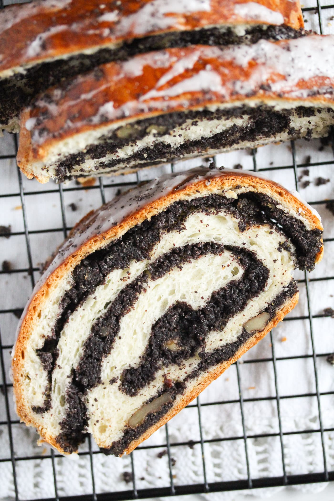 close up of a slice of poppy seed roll.