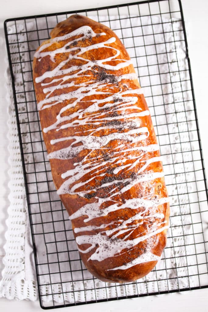 overhead picture of a polish makowiec drizzled with sugar glaze.