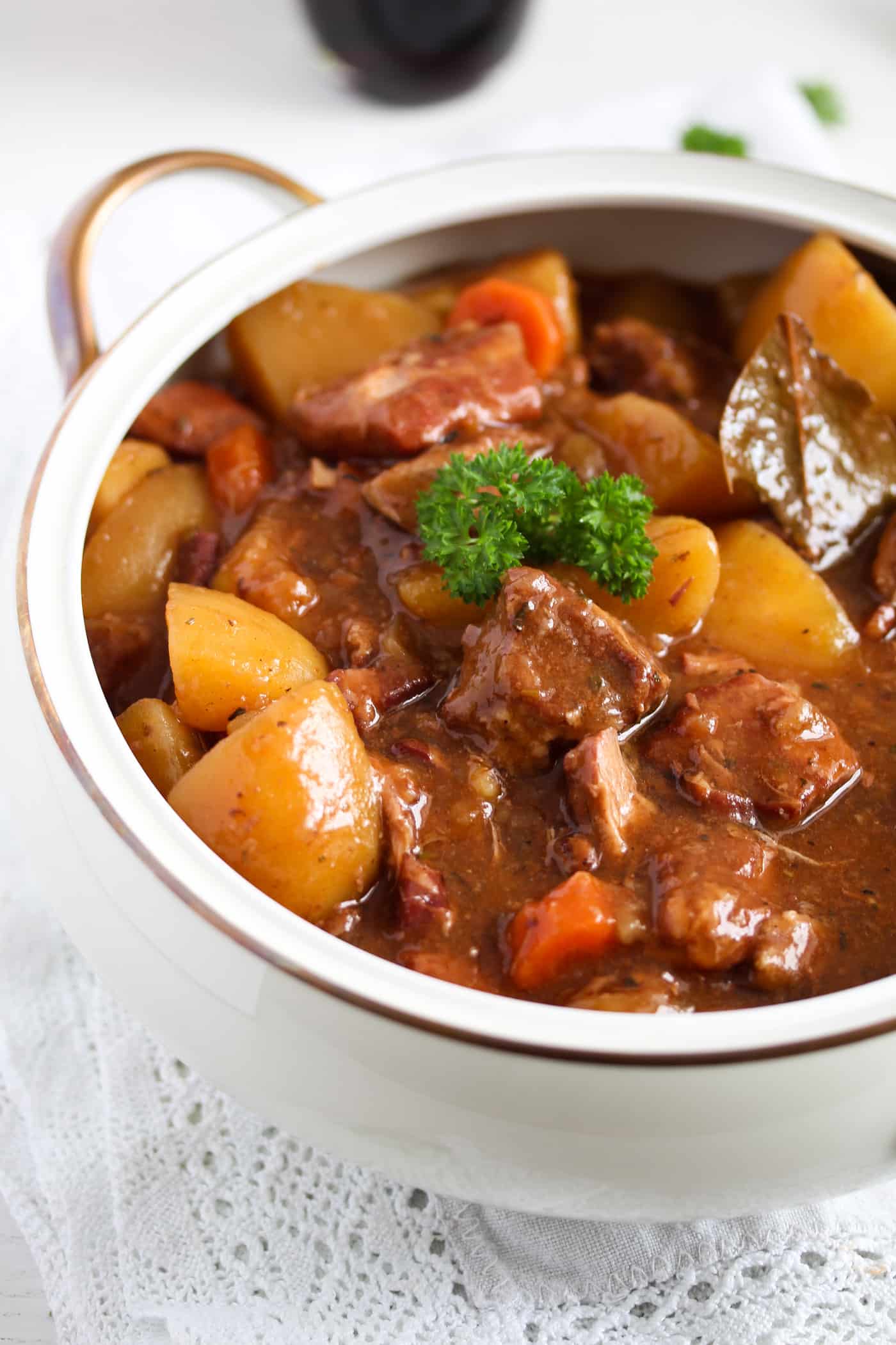 lamb stew with potatoes in a vintage pot.