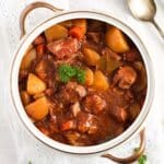 lamb casserole in slow cooker in a vintage pot.
