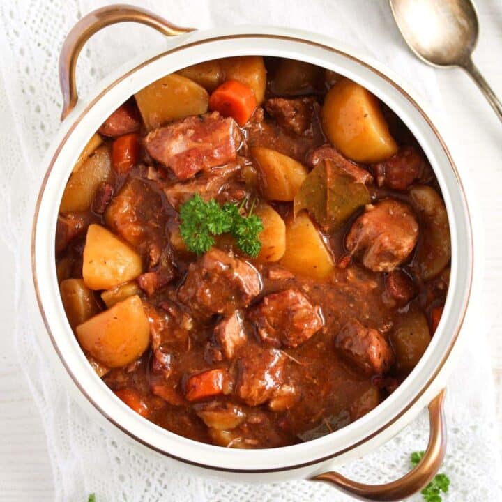 lamb casserole in slow cooker in a vintage pot.
