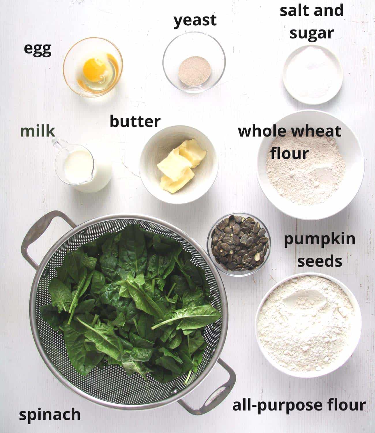 ingredients for spinach bread in bowls.