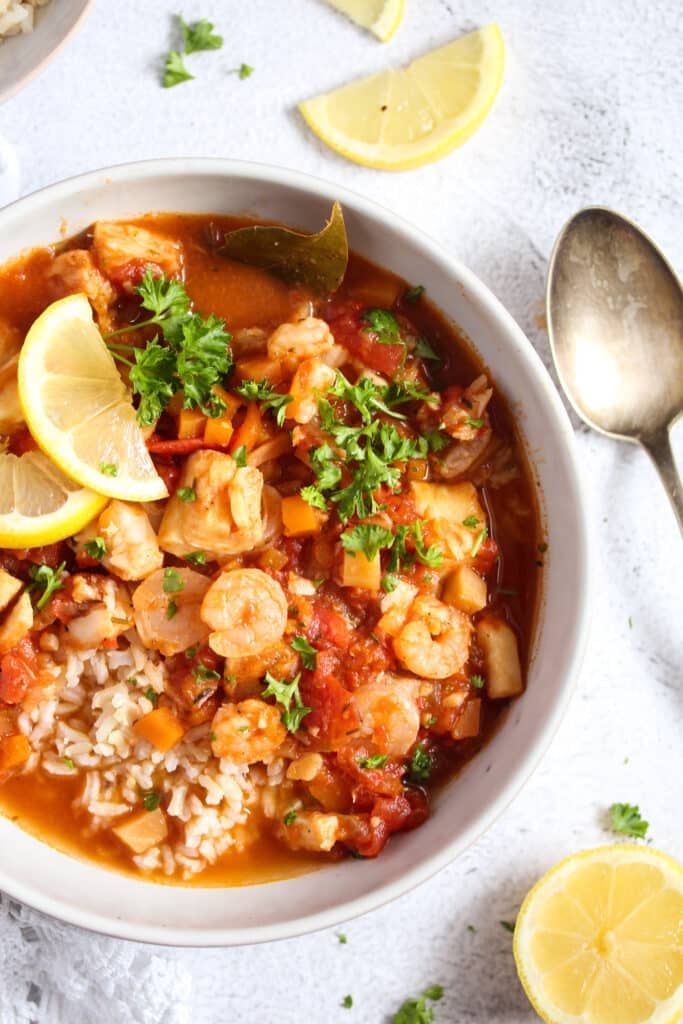 seafood stew served over brown rice.