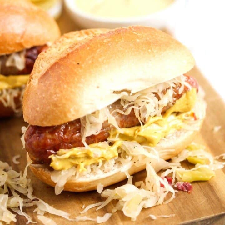 bun stuffed with brat, sauerkraut and mustard.