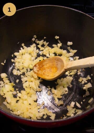 sauteing onions in a pan and stirring with a wooden spoon.