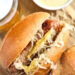 pinterest image with the title frozen air fryer brats.