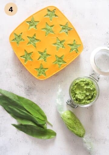 ways of preserving wild garlic butter in a jar, wrapped in plastic wrap or frozen in ice cube molds.