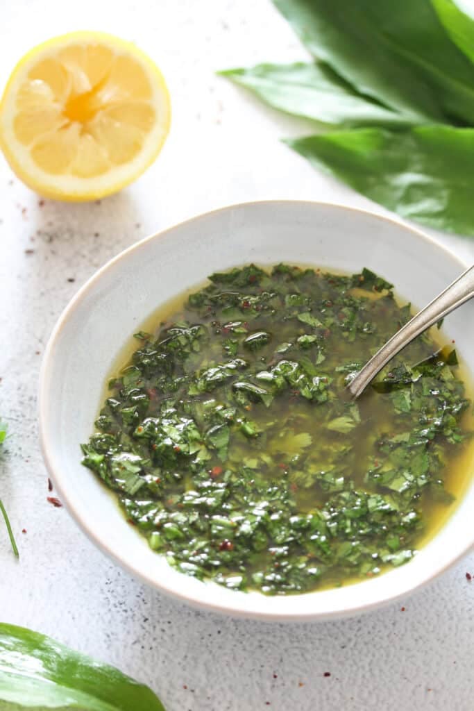 wild garlic sauce with lemon juice in a small bowl.
