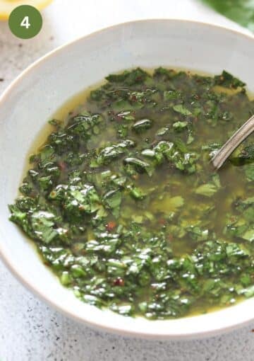bowl of sauce with wild garlic, parsley and olive oil.