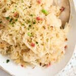 pinterest image of sauerkraut on a platter with the title written under the picture.