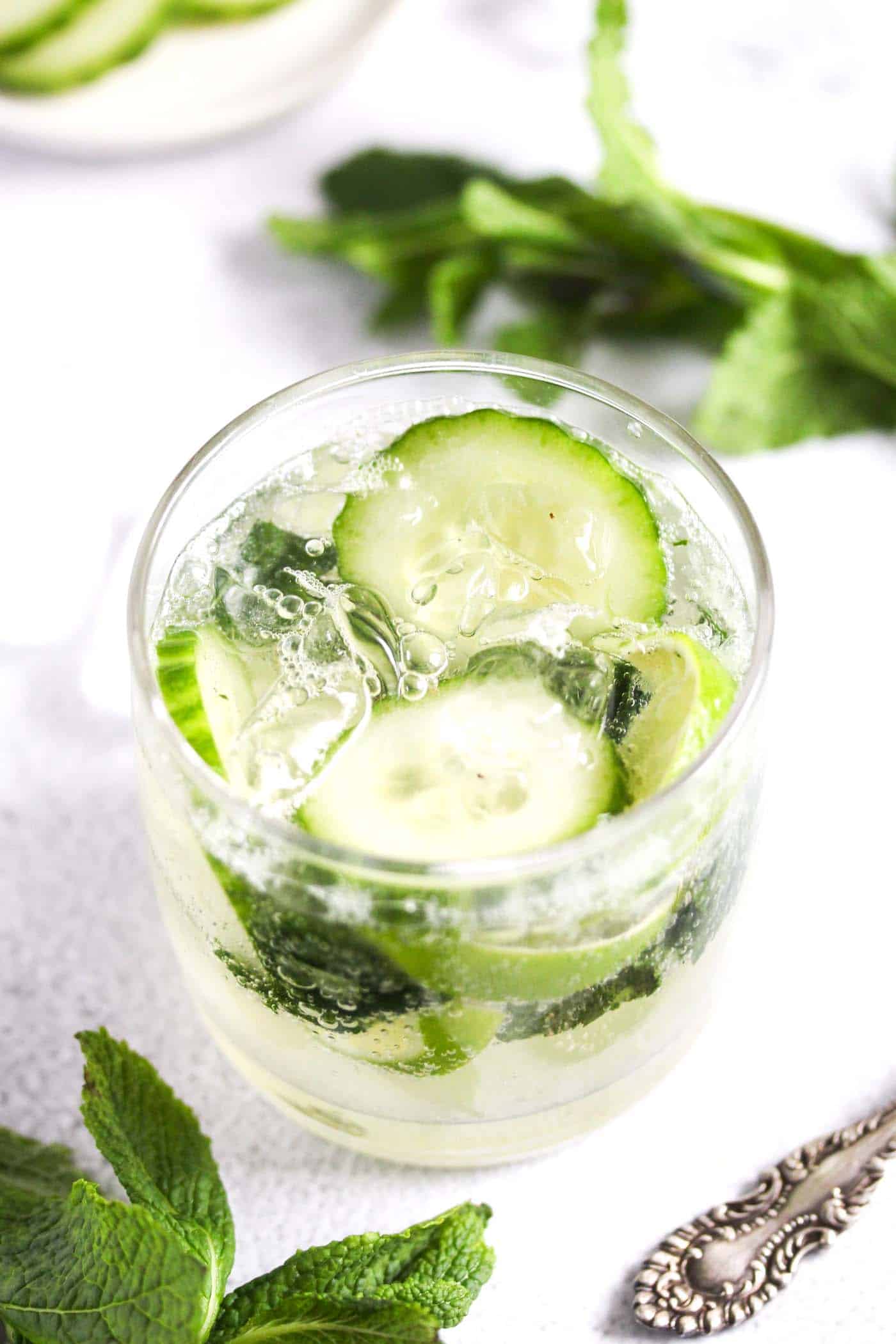 mint and cucumber mojito with gin in a glass.