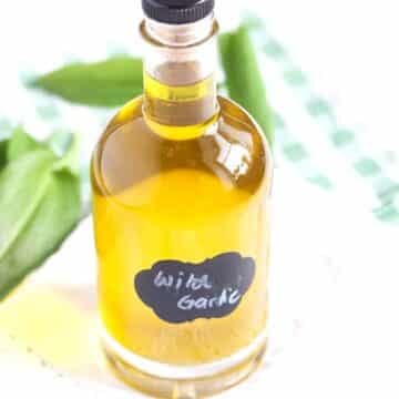 small labeled bottle of wild garlic oil.