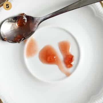 making the jelly test for jam on a plate.