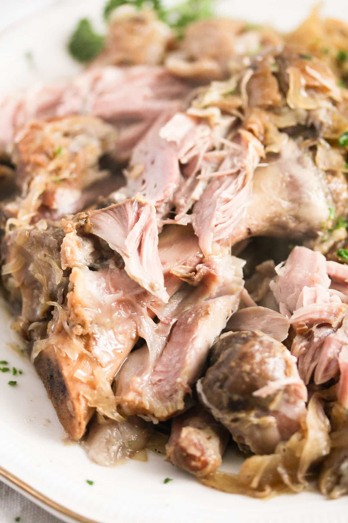 pulled apart tender pork hocks cooked in the slow cooker.