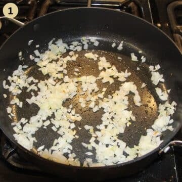 sauteing onions in a pan to make sauerkraut for pork hocks.