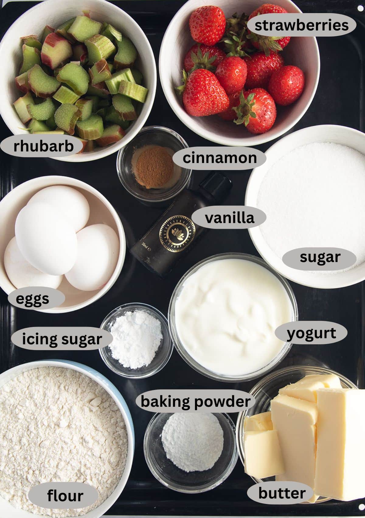labeled ingredients for makkng bundt cake with strawberries and rhubarb.