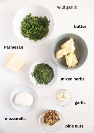 labeled ingredients for making the filling for wild garlic bread.