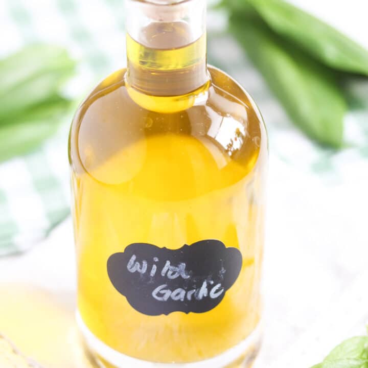 herb oil in a small bottle on the table.
