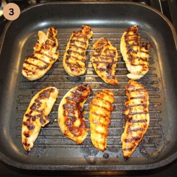 grilled chicken tenders in a grill pan.
