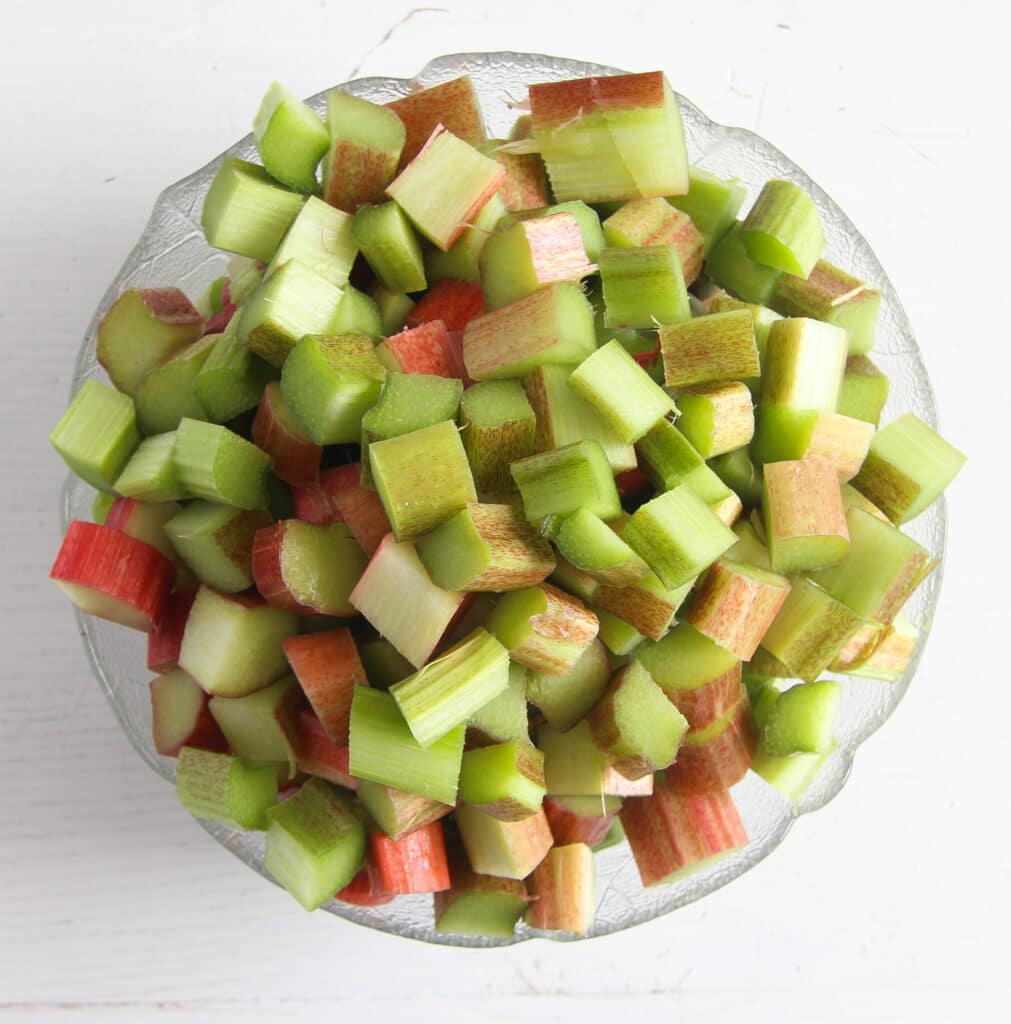 a large bowl full of chopped rhubarb.