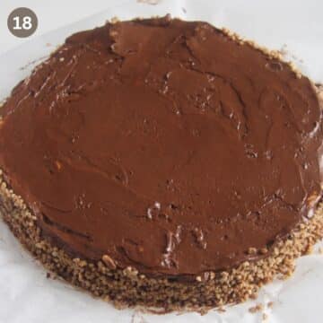 unfinished dobos torte spread with buttercream.