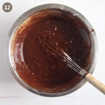 adding melted chocolate to egg and sugar mixture for making buttercream.