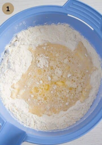 mixing the ingredients for making yeast dough for cake. 