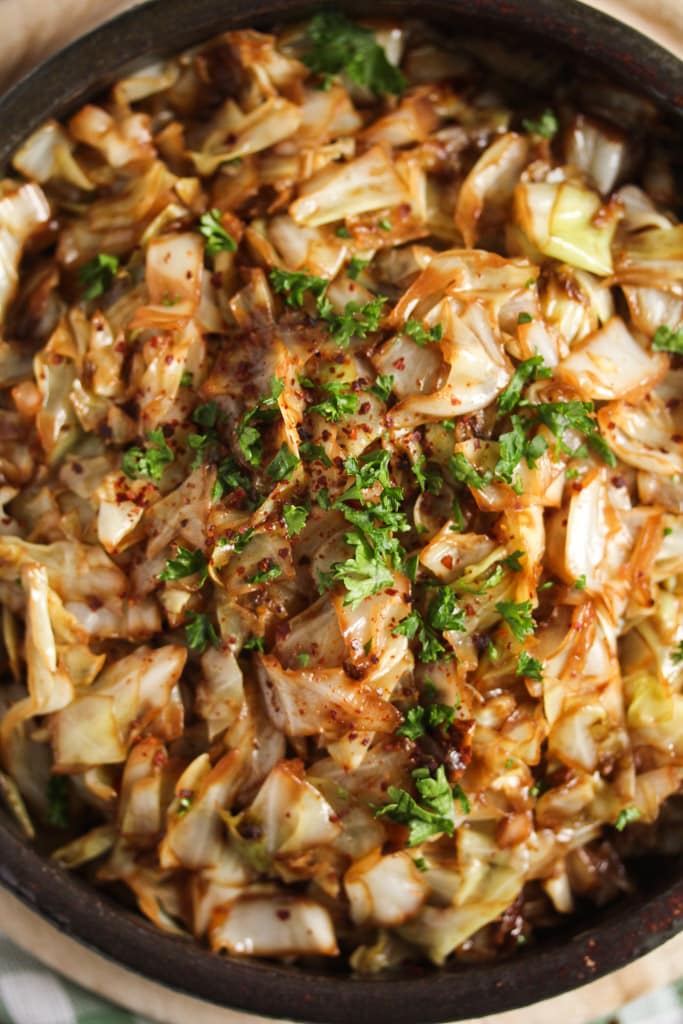 close up of cooked sweet heart cabbage in a bowl.