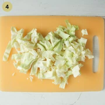 chopped sweetheart cabbage on a cutting board.