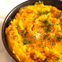 puree of rutabaga and carrots in a bowl.