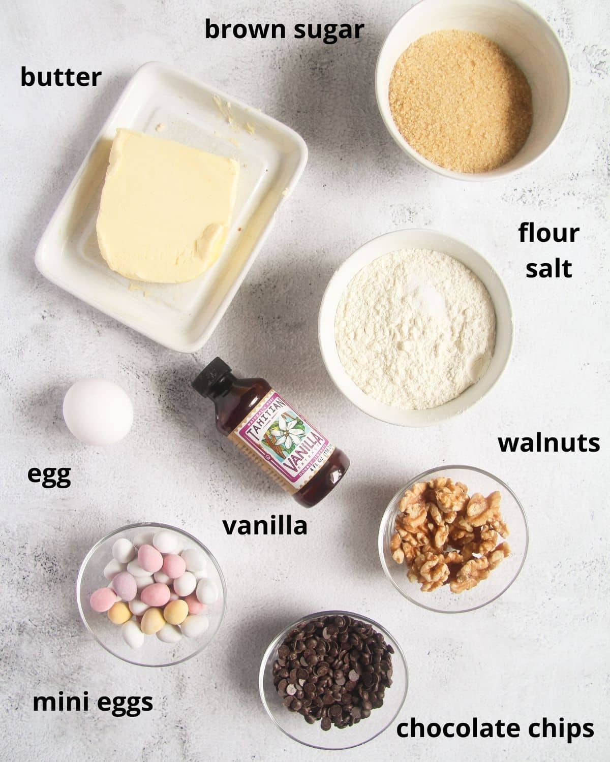listed ingredients for making cookie bars with cadbury eggs and chocolate chips.
