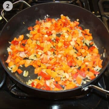 saute carrots, onions, and peppers in a pan.
