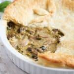 pinterest image with title of chicken pie with mushrooms, leeks and puff pastry.